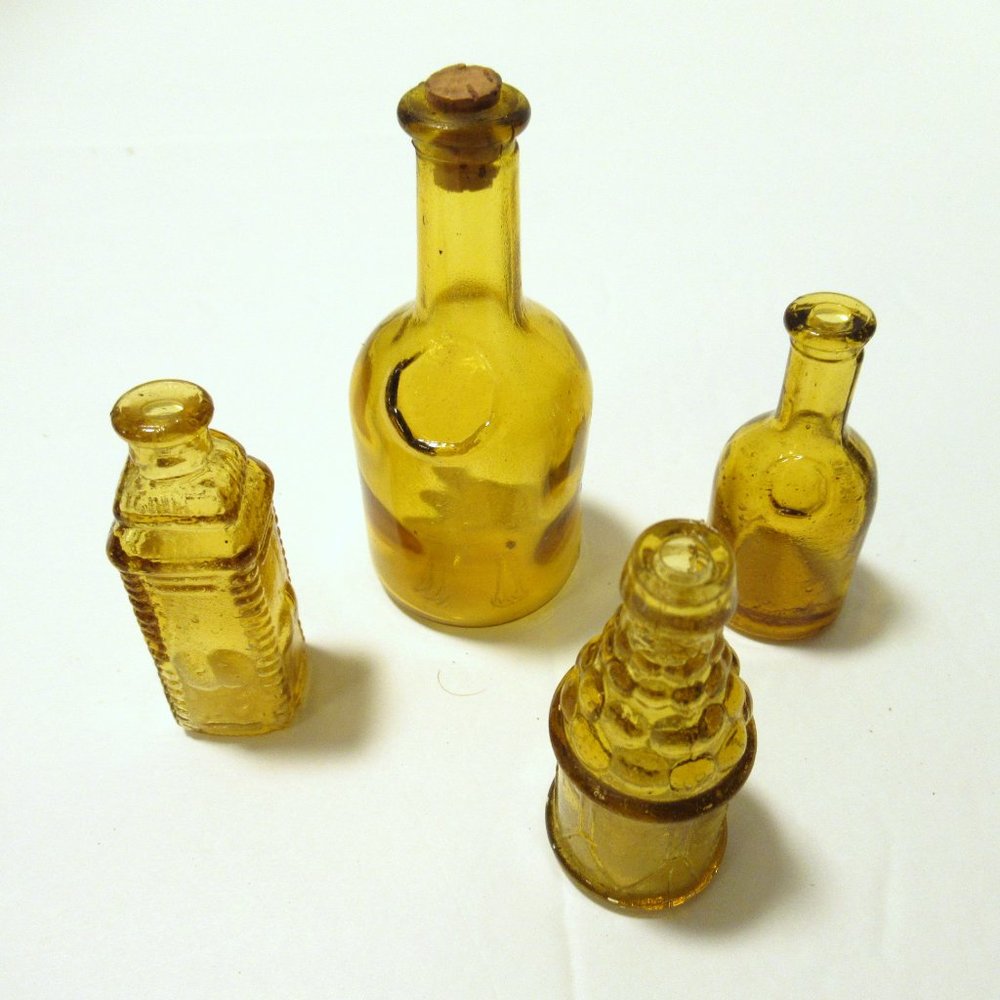 Vintage yellow mini bottles